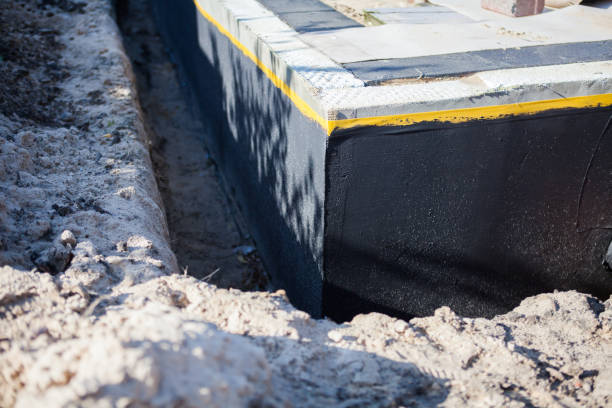 Professional Waterproofing technician working in Monroe, NC